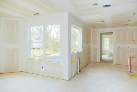 New living area being added to existing home. Drywall is hung and being finished.