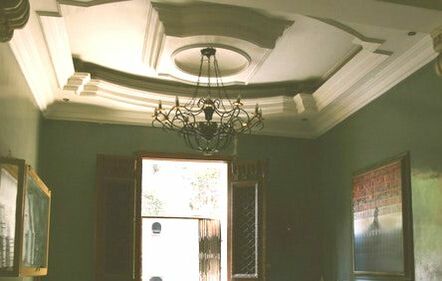 Tray Ceiling with chandelier in living room